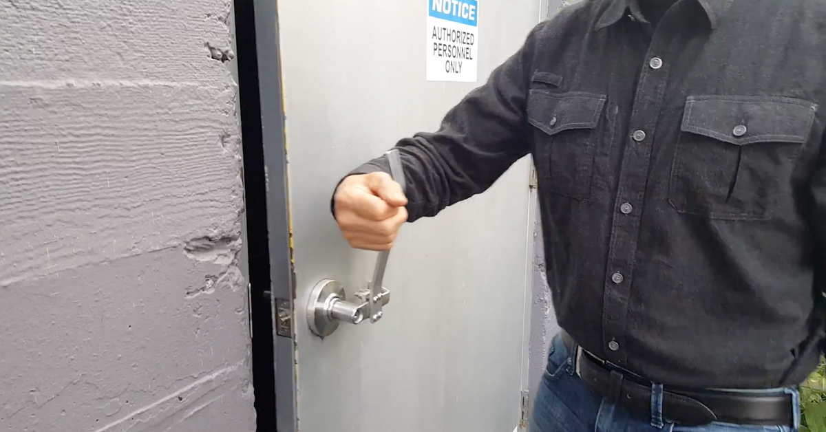 person opening door handle